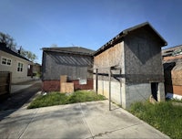 a house with a roof made of straw